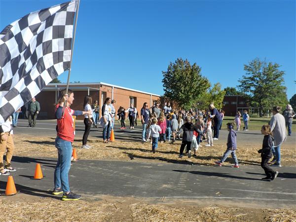 A ribbon being cut for a new track at FES.
